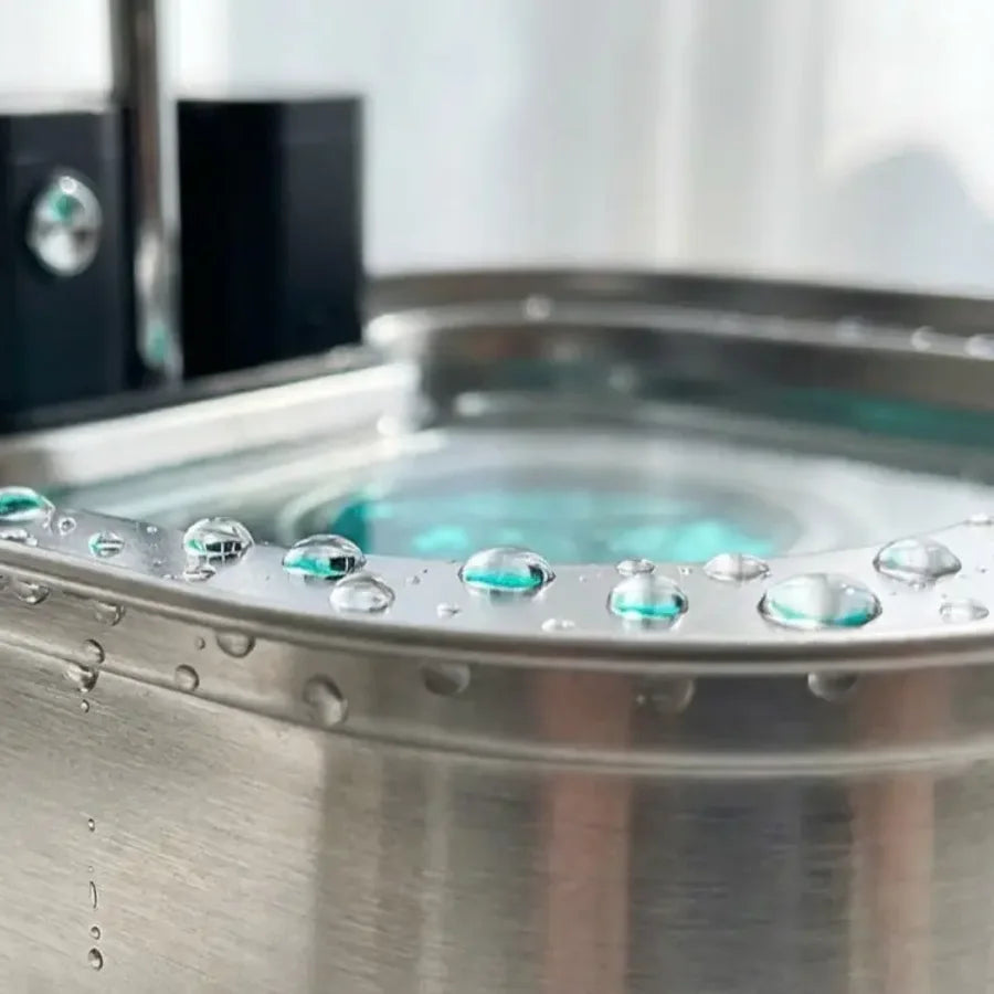 KaiShine: filtered water flowing into a stainless basin